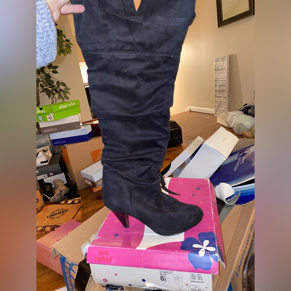 Knee high soft heeled boots